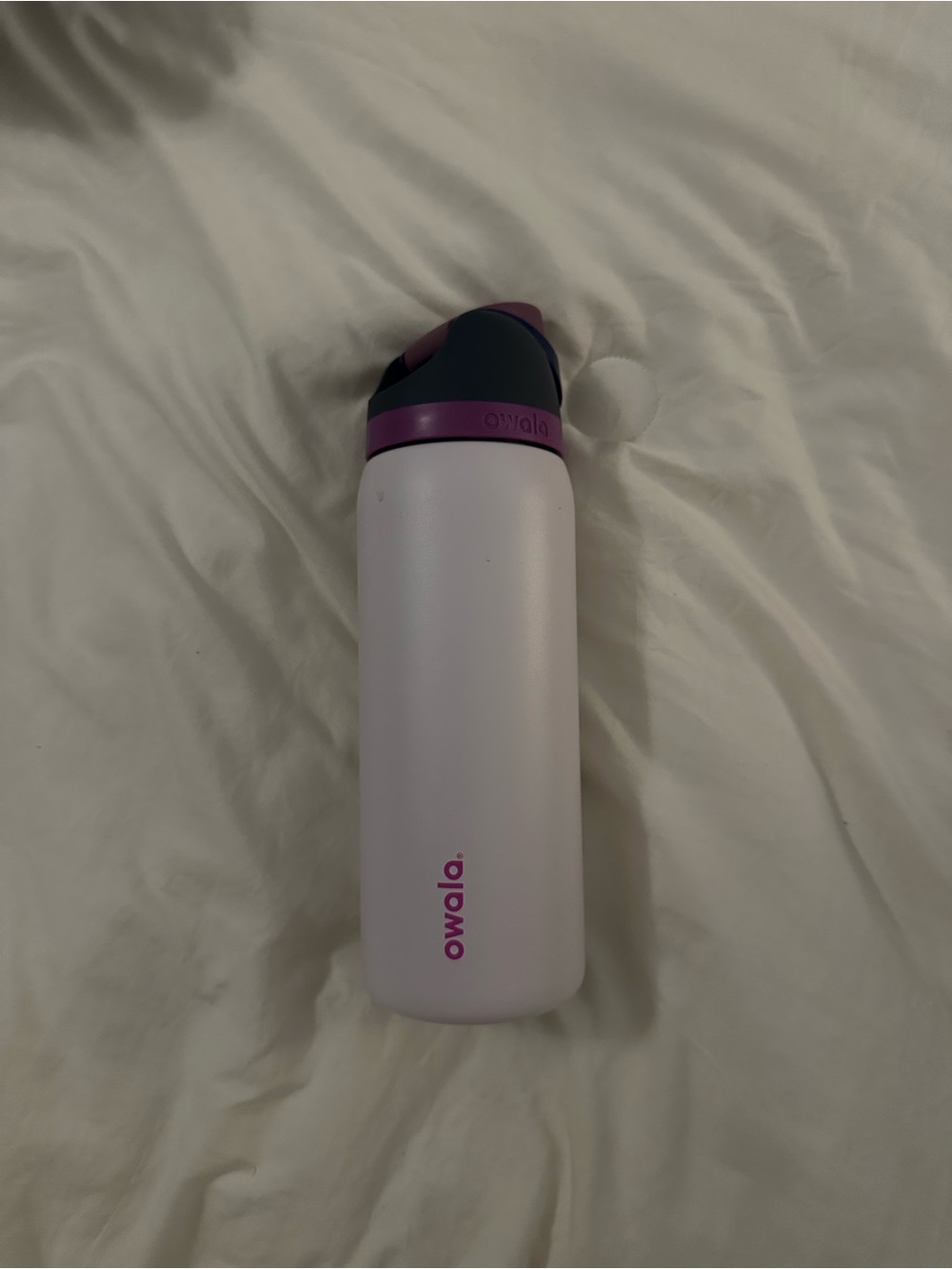 Owala Water Bottle in white with Purple Accents, straw not included; 32 oz
